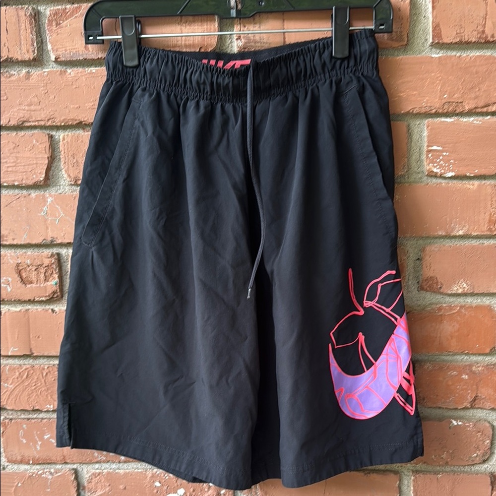 Nike flower swoosh shorts.